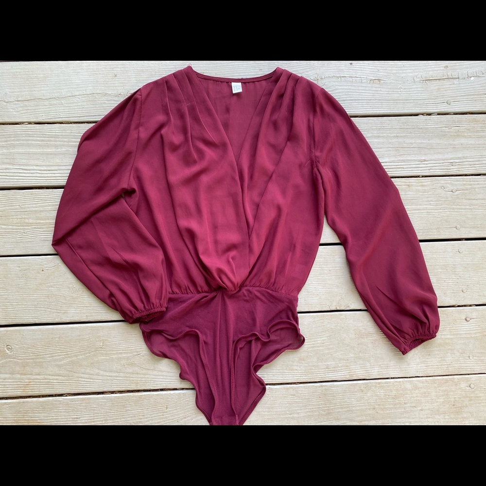 Women’s maroon v-neck long sleeve leotard bodysuit
